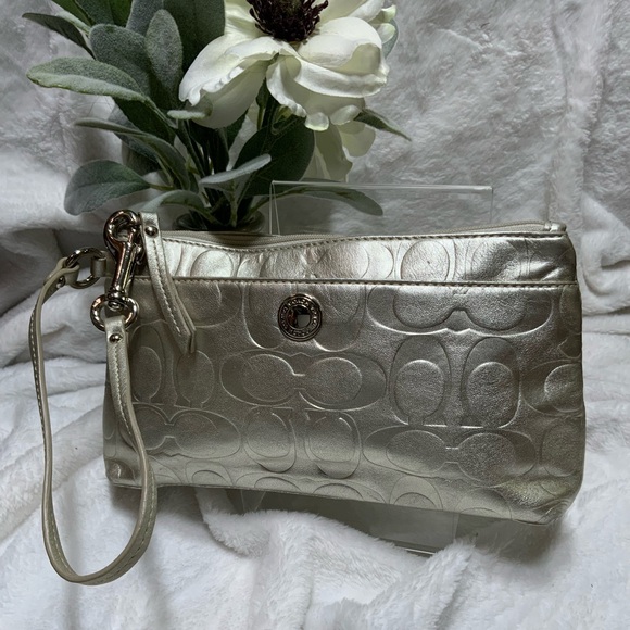 Coach Handbags - Coach Metallic Silver Wristlet Clutch